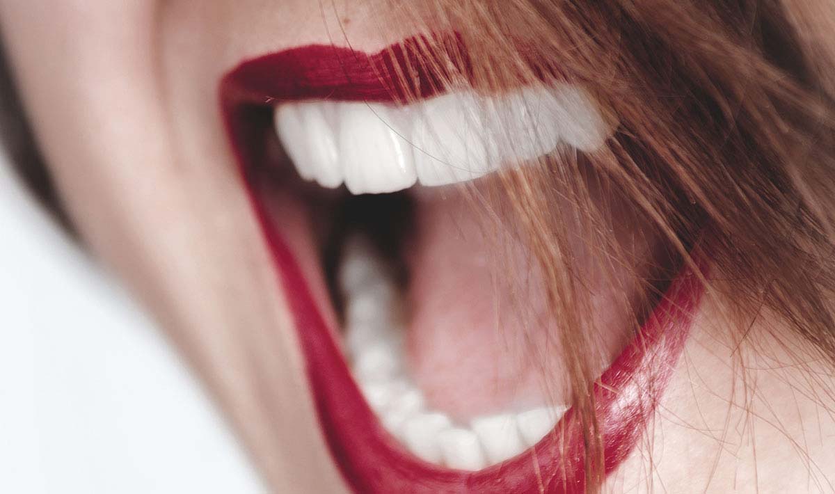 Close-up of smiling mouth.